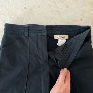 Chloe navy-black bootcut trousers.